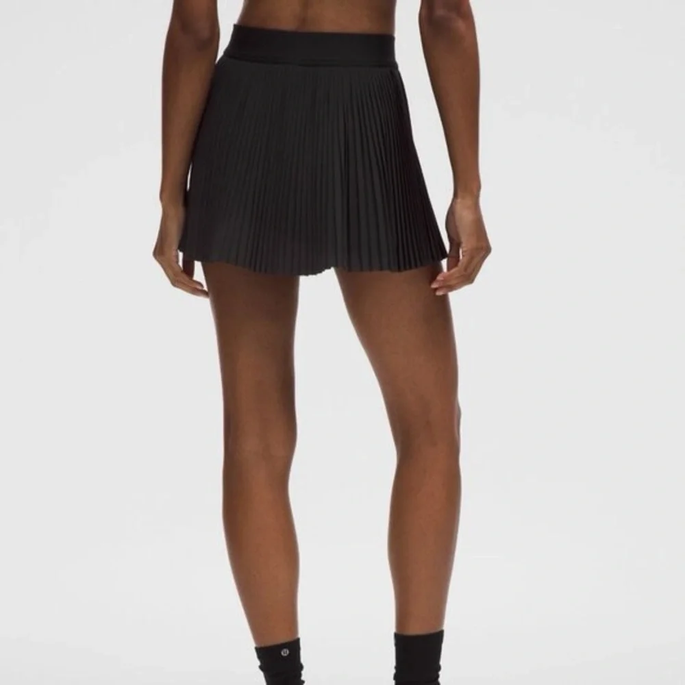 Varsity High-Rise Pleated Tennis Skirt In Black - Picture 3 of 8